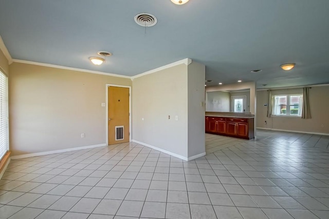 1021 Maplewood Dr, Harvey, LA 70058 - spare room featuring crown molding and baseboards