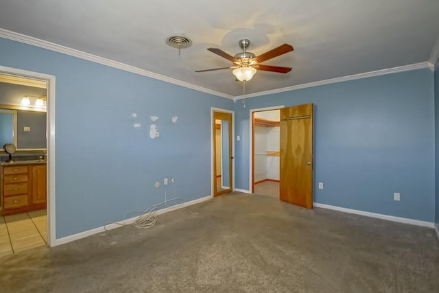 1021 Maplewood Dr, Harvey, LA 70058 - unfurnished bedroom featuring baseboards, visible vents, ornamental molding, and carpet floors