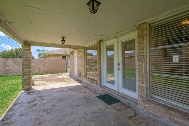 1021 Maplewood Dr, Harvey, LA 70058 - view of patio / terrace with french doors and fence