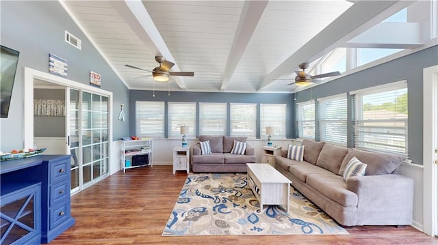 31763 Shelton Dr, Springfield, LA 70462 - living area with wood finished floors, vaulted ceiling with beams, visible vents, and ceiling fan