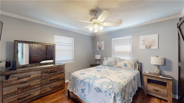 31763 Shelton Dr, Springfield, LA 70462 - bedroom with wood finished floors, a textured ceiling, and crown molding