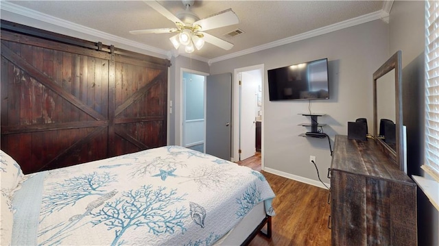 31763 Shelton Dr, Springfield, LA 70462 - bedroom featuring wood finished floors, ceiling fan, baseboards, ornamental molding, and visible vents