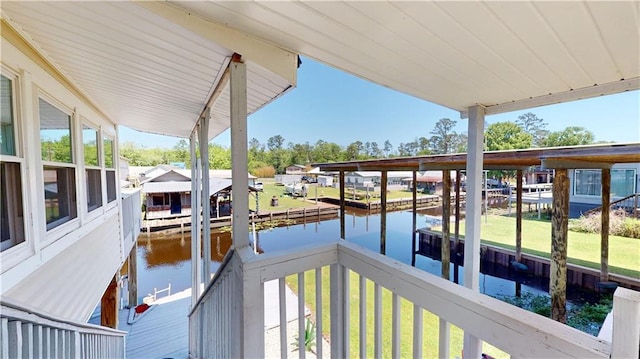 31763 Shelton Dr, Springfield, LA 70462 - exterior space featuring a lawn and a water view