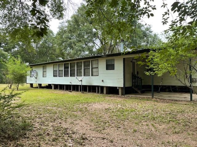 46038 Wooding Ln, Franklinton, LA 70438 - back of property with a lawn