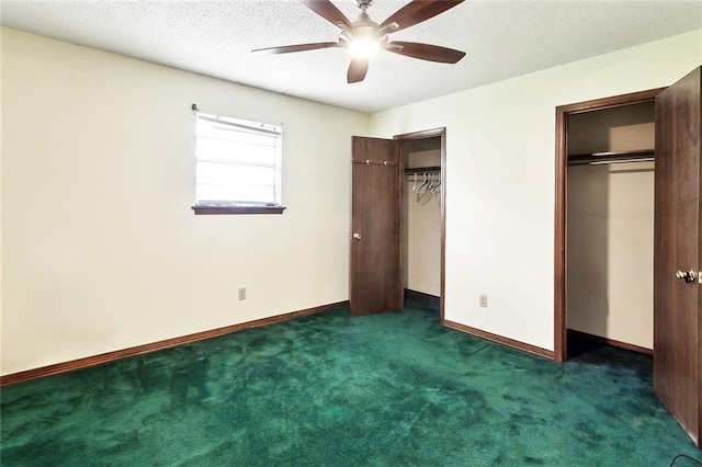 716 N Woodlawn Ave, Metairie, LA 70001 - unfurnished bedroom with multiple closets, dark colored carpet, baseboards, and a ceiling fan