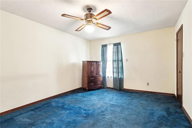 716 N Woodlawn Ave, Metairie, LA 70001 - spare room with carpet, a ceiling fan, a textured ceiling, and baseboards