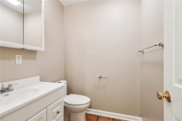 4738 Banks St, New Orleans, LA 70119 - half bathroom with toilet, vanity, tile patterned floors, and baseboards