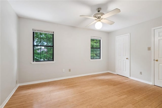 4738 Banks St, New Orleans, LA 70119 - unfurnished room featuring light wood finished floors, ceiling fan, and baseboards
