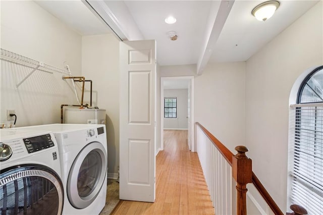 4738 Banks St, New Orleans, LA 70119 - laundry room featuring separate washer and dryer and light wood finished floors