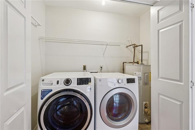 4738 Banks St, New Orleans, LA 70119 - laundry room featuring water heater, independent washer and dryer, and tile patterned floors