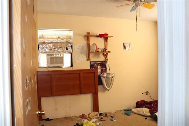 unfurnished bedroom featuring cooling unit and carpet