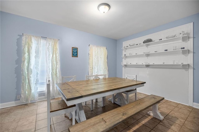 52475 Wilson Rd, Folsom, LA 70437 - dining area with light tile patterned flooring and baseboards