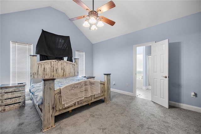 52475 Wilson Rd, Folsom, LA 70437 - bedroom with vaulted ceiling, carpet, baseboards, a ceiling fan, and connected bathroom