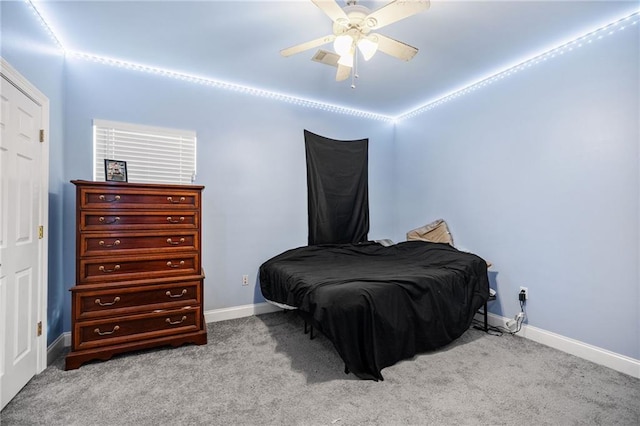 52475 Wilson Rd, Folsom, LA 70437 - carpeted bedroom with baseboards and a ceiling fan