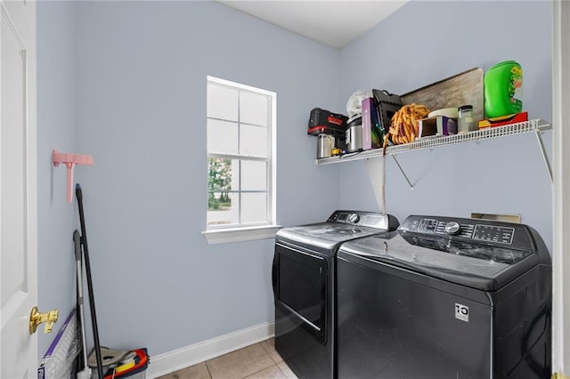 52475 Wilson Rd, Folsom, LA 70437 - laundry room with washing machine and clothes dryer, baseboards, and light tile patterned flooring