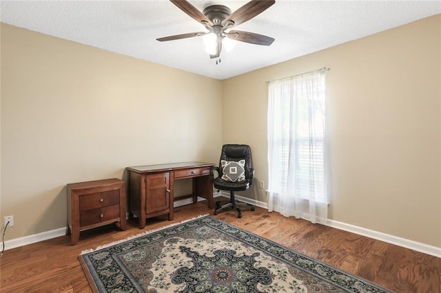 4740 W Esplanade Ave, Metairie, LA 70006 - sitting room with wood finished floors, baseboards, and ceiling fan