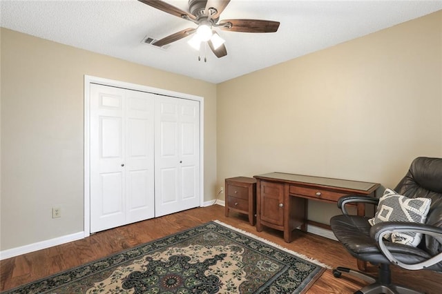4740 W Esplanade Ave, Metairie, LA 70006 - home office with baseboards, wood finished floors, visible vents, and ceiling fan