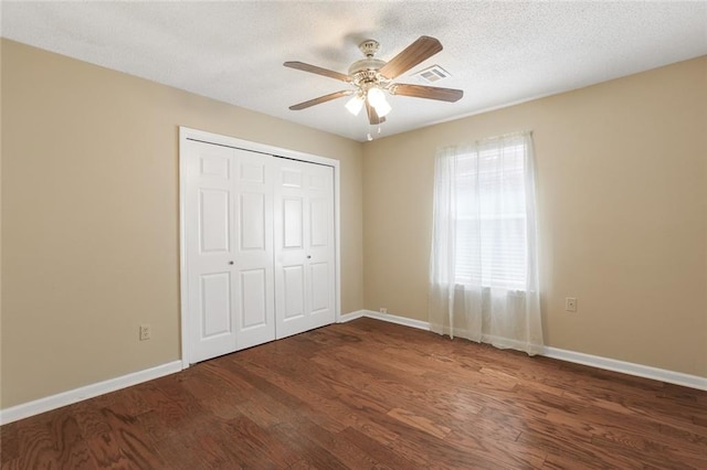 4740 W Esplanade Ave, Metairie, LA 70006 - unfurnished bedroom featuring wood finished floors, a closet, and baseboards