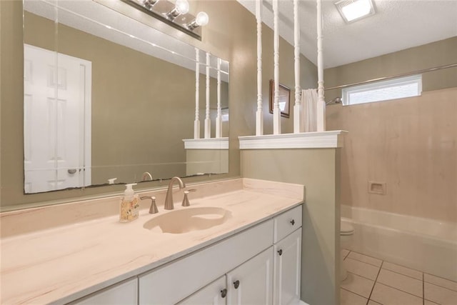 4740 W Esplanade Ave, Metairie, LA 70006 - bathroom with a textured ceiling, vanity, shower / tub combo, toilet, and tile patterned flooring
