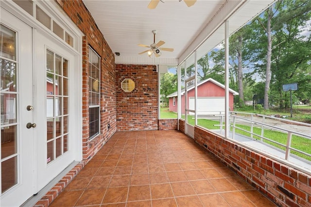 4761 Sharp Rd, Mandeville, LA 70471 - unfurnished sunroom featuring a ceiling fan and french doors