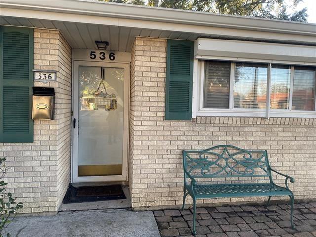 536 Olive Dr, Harvey, LA 70058 - entrance to property with brick siding
