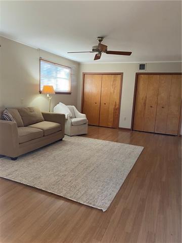 536 Olive Dr, Harvey, LA 70058 - living area featuring ceiling fan and wood finished floors