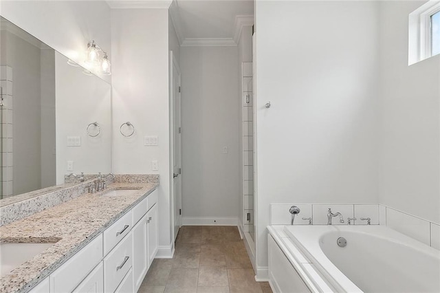 full bath featuring a bath, double vanity, crown molding, and a sink