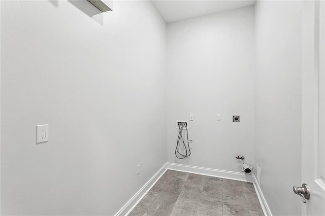 laundry area with laundry area, electric dryer hookup, hookup for a gas dryer, washer hookup, and baseboards