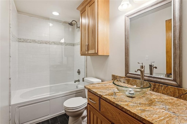 full bathroom featuring shower / bathtub combination, toilet, and vanity