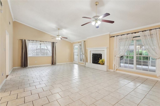 unfurnished living room with lofted ceiling, a ceiling fan, baseboards, crown molding, and a fireplace with raised hearth