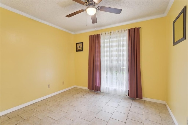 spare room featuring a textured ceiling, ceiling fan, ornamental molding, light tile patterned floors, and baseboards
