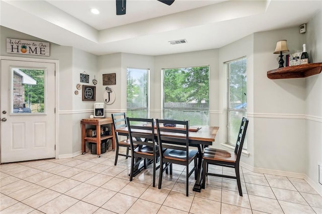 1229 Hampton Ct, Slidell, LA 70460 - dining room featuring ceiling fan, baseboards, a wealth of natural light, and light tile patterned floors