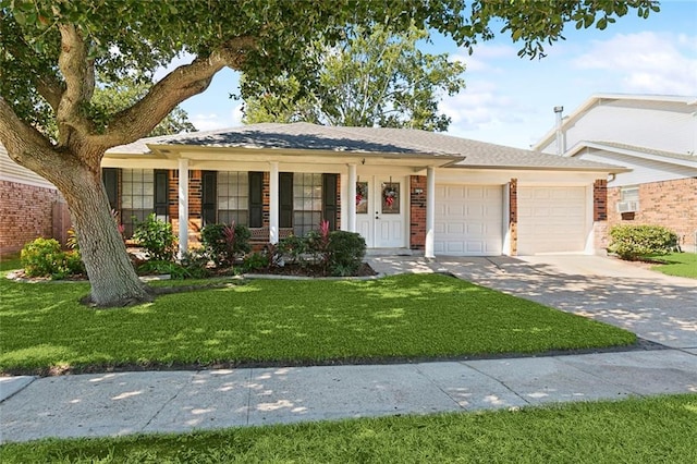 ranch-style home featuring covered porch, brick siding, a front yard, concrete driveway, and an attached garage