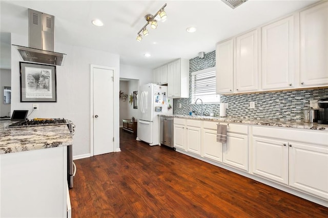 kitchen with dark wood-type flooring, tasteful backsplash, white cabinetry, dishwasher, and freestanding refrigerator