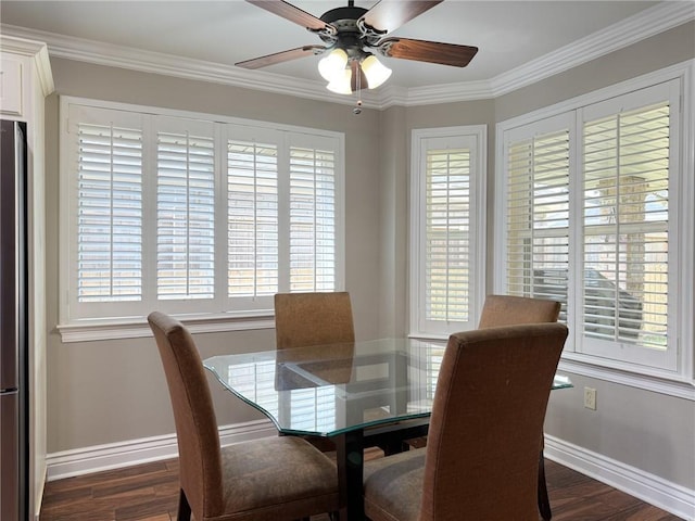 4612 Lorino St, Metairie, LA 70006 - dining space featuring baseboards, ceiling fan, crown molding, and dark wood-style floors