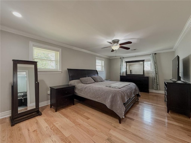 4612 Lorino St, Metairie, LA 70006 - bedroom with light wood-style floors, ornamental molding, baseboards, and a ceiling fan