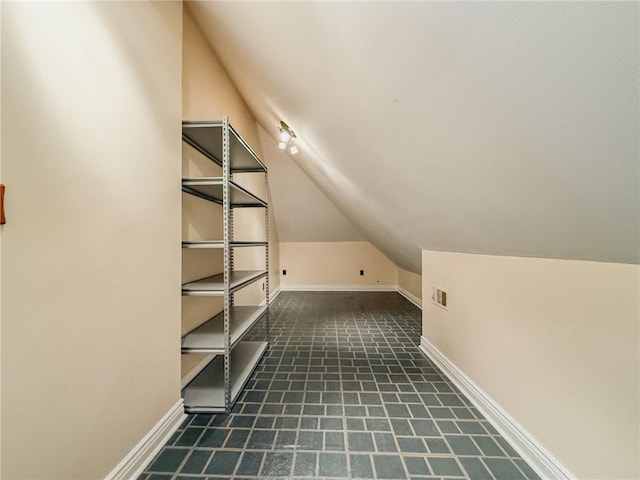 4612 Lorino St, Metairie, LA 70006 - additional living space with vaulted ceiling and baseboards