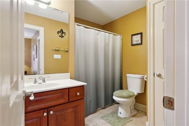 bathroom featuring a shower with curtain, vanity, toilet, visible vents, and tile patterned flooring