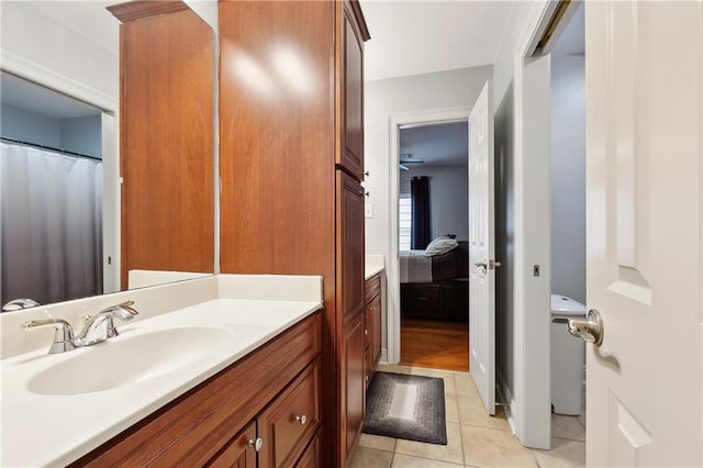 bathroom with tile patterned flooring and vanity