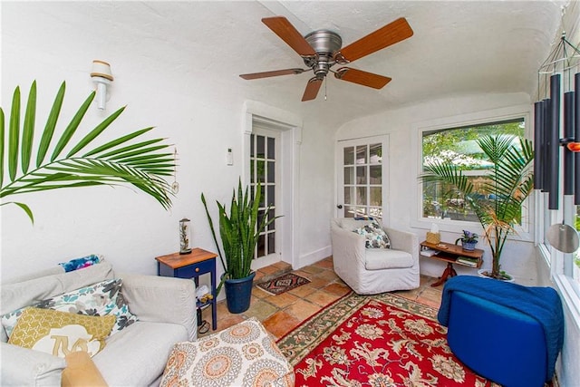 living room with a ceiling fan