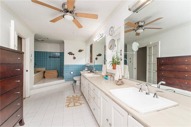 full bath featuring tiled shower, tile patterned flooring, a sink, a ceiling fan, and crown molding