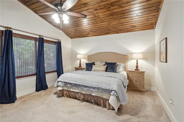 bedroom featuring wood ceiling, baseboards, vaulted ceiling, carpet, and a ceiling fan