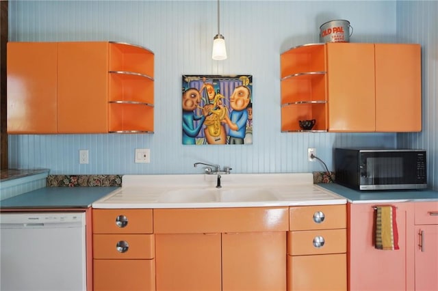 kitchen with decorative light fixtures, open shelves, light countertops, dishwasher, and black microwave