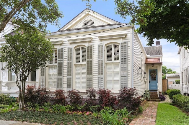 5934 Chestnut St, New Orleans, LA 70118 - greek revival house with entry steps