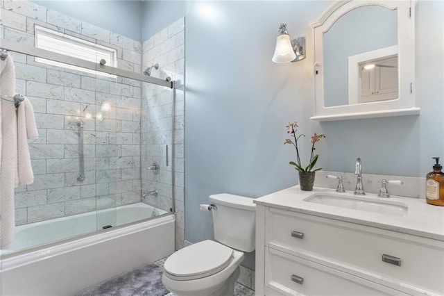 5934 Chestnut St, New Orleans, LA 70118 - bathroom with toilet, combined bath / shower with glass door, and vanity