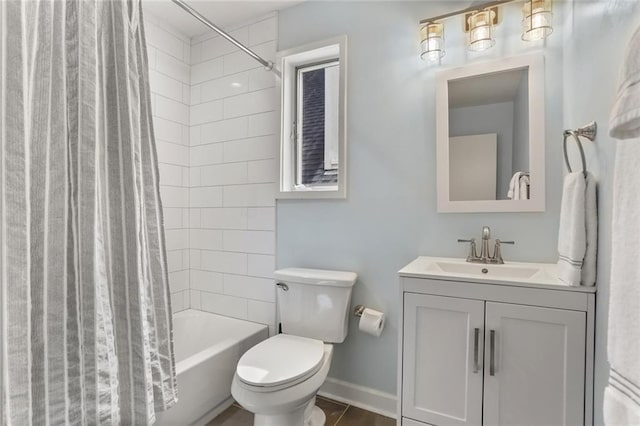 5934 Chestnut St, New Orleans, LA 70118 - bathroom with toilet, shower / bath combination with curtain, vanity, and baseboards