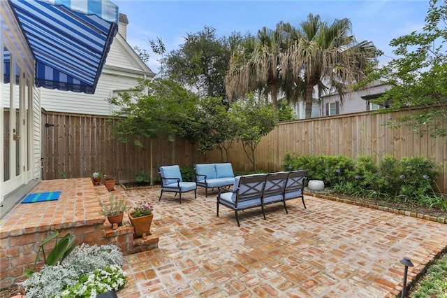 5934 Chestnut St, New Orleans, LA 70118 - view of patio / terrace featuring an outdoor hangout area and a fenced backyard