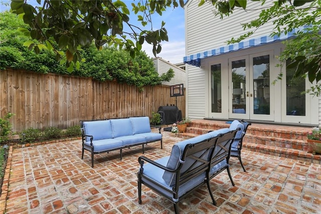 5934 Chestnut St, New Orleans, LA 70118 - view of patio with outdoor lounge area, french doors, a fenced backyard, and grilling area