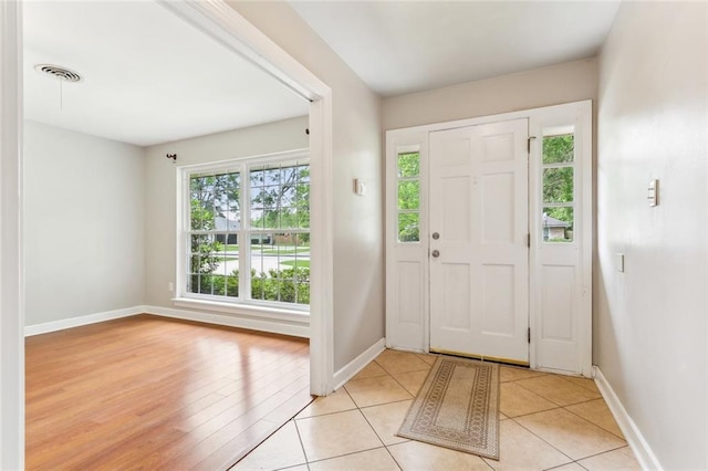 entryway with visible vents and baseboards