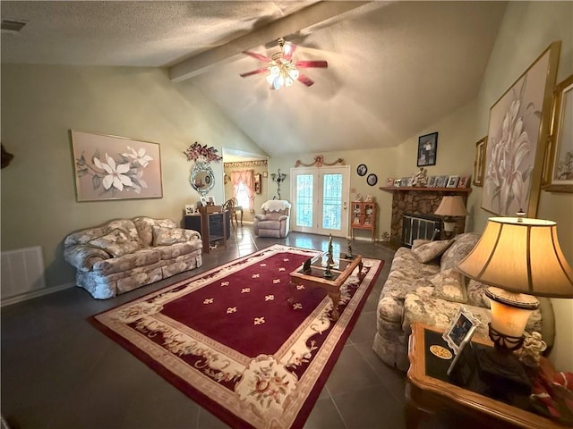 2053 Saulet Pl, Harvey, LA 70058 - living room with a ceiling fan, a textured ceiling, and a fireplace